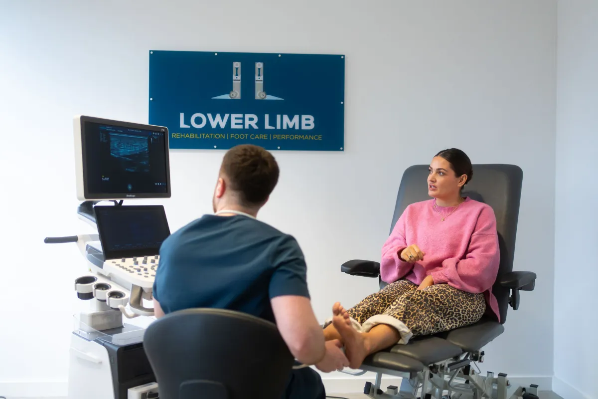 Patient consultation for heel pain assessment at Lower Limb Clinic Belfast